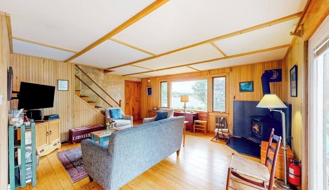 Dog-friendly ocean-view duplex with wood stoves, decks, grills, kitchens, ACs