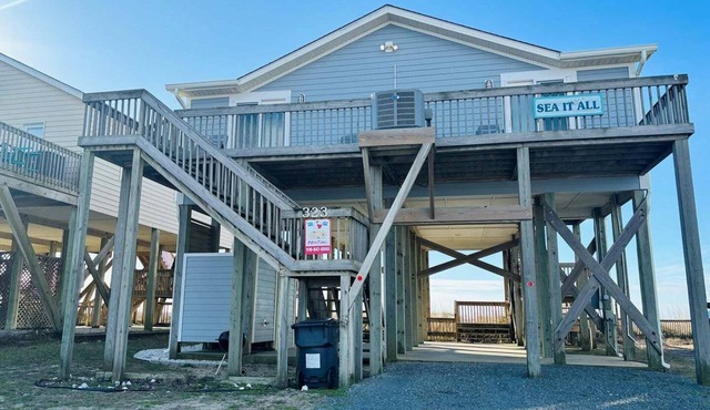 Experience beachfront bliss at Sea It All in Holden Beach, NC, perfect for 6 guests.