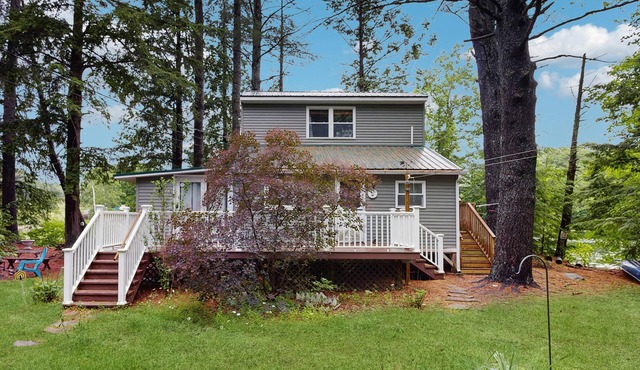 Lakefront Home on Togus Pond with 2 Decks, Great View & Canoe/Fire Pit
