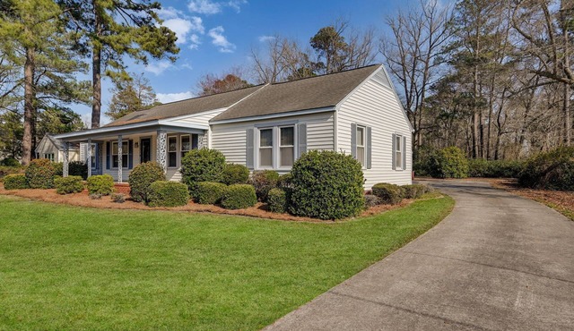 Large house with ample parking, game room, and 2 living rooms. Great for groups.