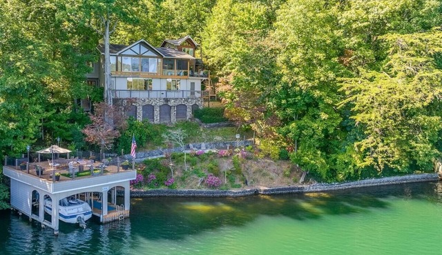 Luxury 5BR Lake Burton home with dock, game room, and lakeside views.