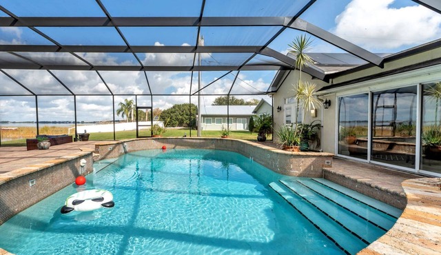 Luxury Lakefront Retreat | Heated Pool, Theater & Private Dock | Near Legoland | EV Charger