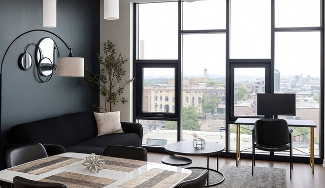 Modern 2BR Gem | Rooftop Pool + Workspaces