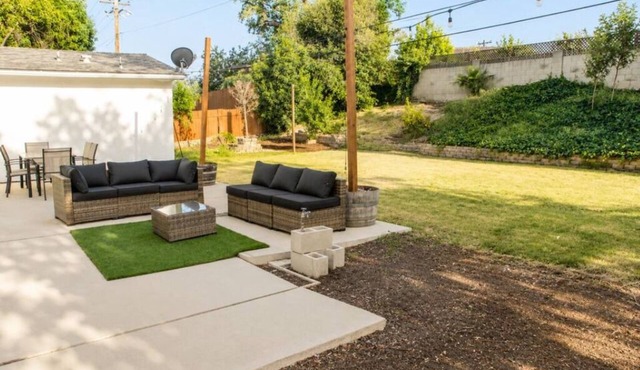 Modern 4BR Retreat With Yard, Garage With EV Outdoor Plug for Electric Cars!