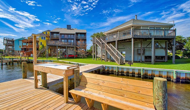 Sunny canal-front home w/deck, boat dock, private washer/dryer, & central AC