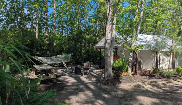 The Rustic Glamping Tent Where Coastal Charm Awaits – 2 Miles from Holden Beach