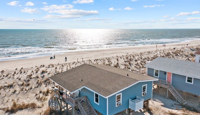 Timeless Oceanfront Cottage Near Pier with Grill & Fishing Station