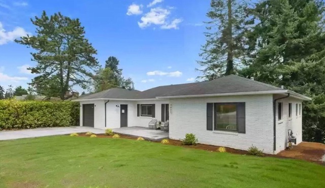 Two-story home with spacious yard, washer/dryer & central AC- dog-friendly
