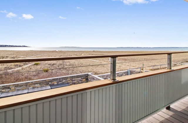 Lighthouse Suites are located directly on the white sands of Pine Point Beach.