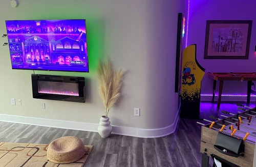 Castleberry Hill Apartment | Welcome to your fun 2BR/2BA arcade loft—relax, play, and enjoy your stay!