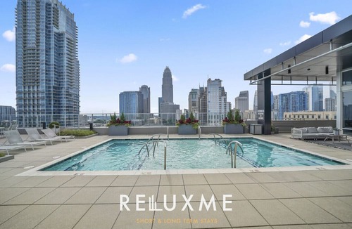 Fourth Ward Condo | Reluxme | City Center 2BR Highrise w/King Beds