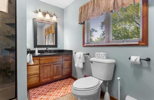 Greenville House | Lakefront Chalet-Style Home with Large Deck, a Dock & Beautiful Lake Views